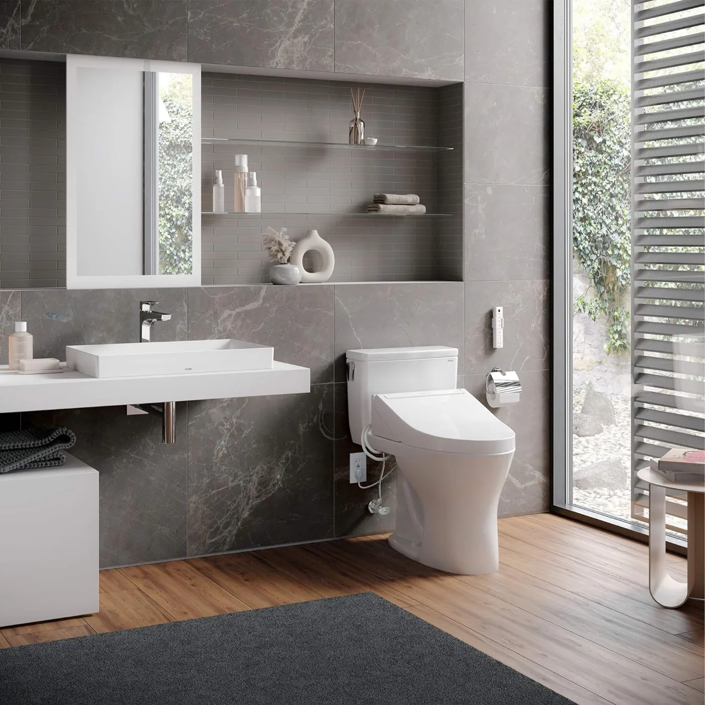 Washlet bidet seat wired to a discreet outlet in a modern bathroom